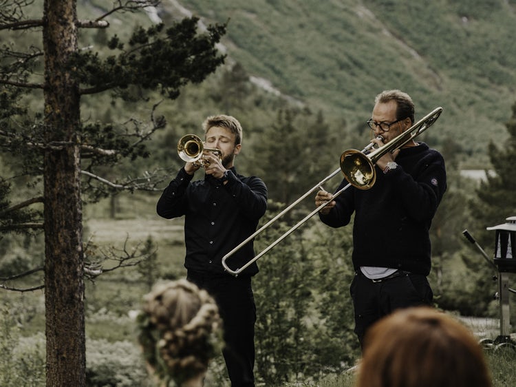 Musicians playing at a humanist wedding ceremony, set in a Norwegian landscape